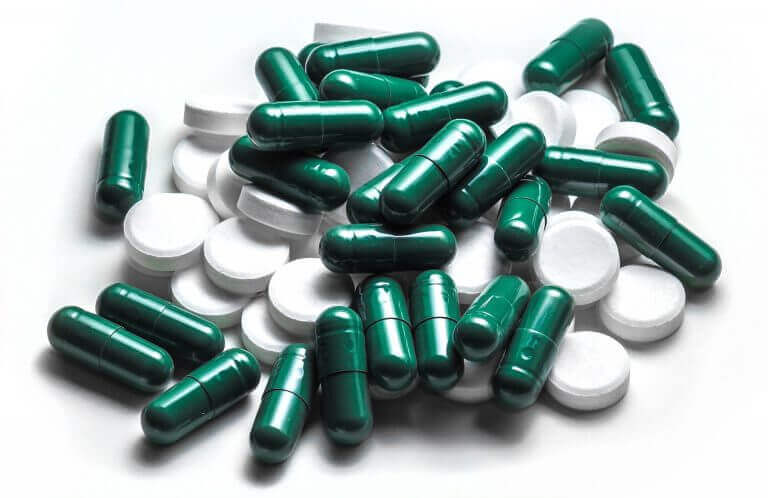 green and white pills
